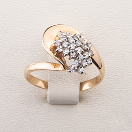 Золотое кольцо в красном с белым цвете с цирконом