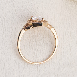 Золотое кольцо красного цвета с цирконом